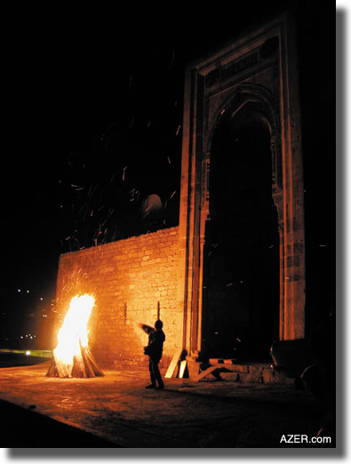 On the Tuesday before Novruz (March 20 or 21 which can occur on any day), bonfires are built in the streets and fields throughout the country. Typically, the young boys run and jump over the fire. It is supposed to represent a fresh start in the new year. Here a fire had been built outside the 15th-century Shirvanshah Complex in the Inner City of Baku.  Ivar Magne Auestad