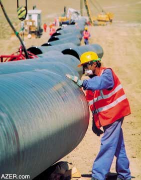 Pipe for the BTC pipeline being strung along the Right of Way.