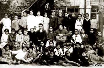 Young Chingiz Mustafayev is seated on the bench on the second row, third from the left. He was eight years old, 1931. Photo: Courtesy the family of Chingiz Mustafayev.